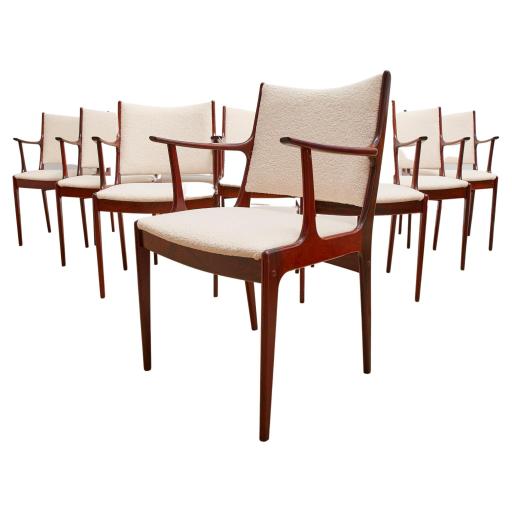 Set of 8 Rosewood Danish dining chairs upholstered in cream boucle, 1960s